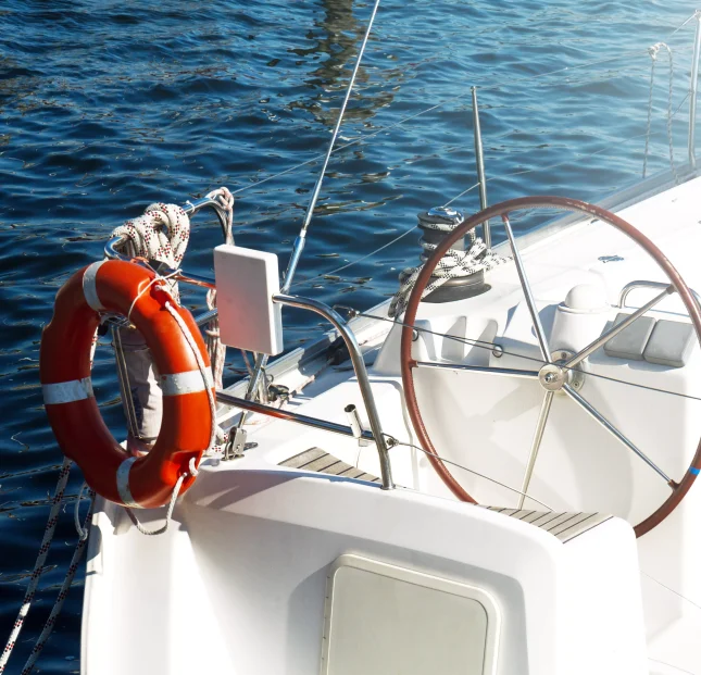 closeup-beautiful-yacht-rudder-daylight-horizontal-sea-background